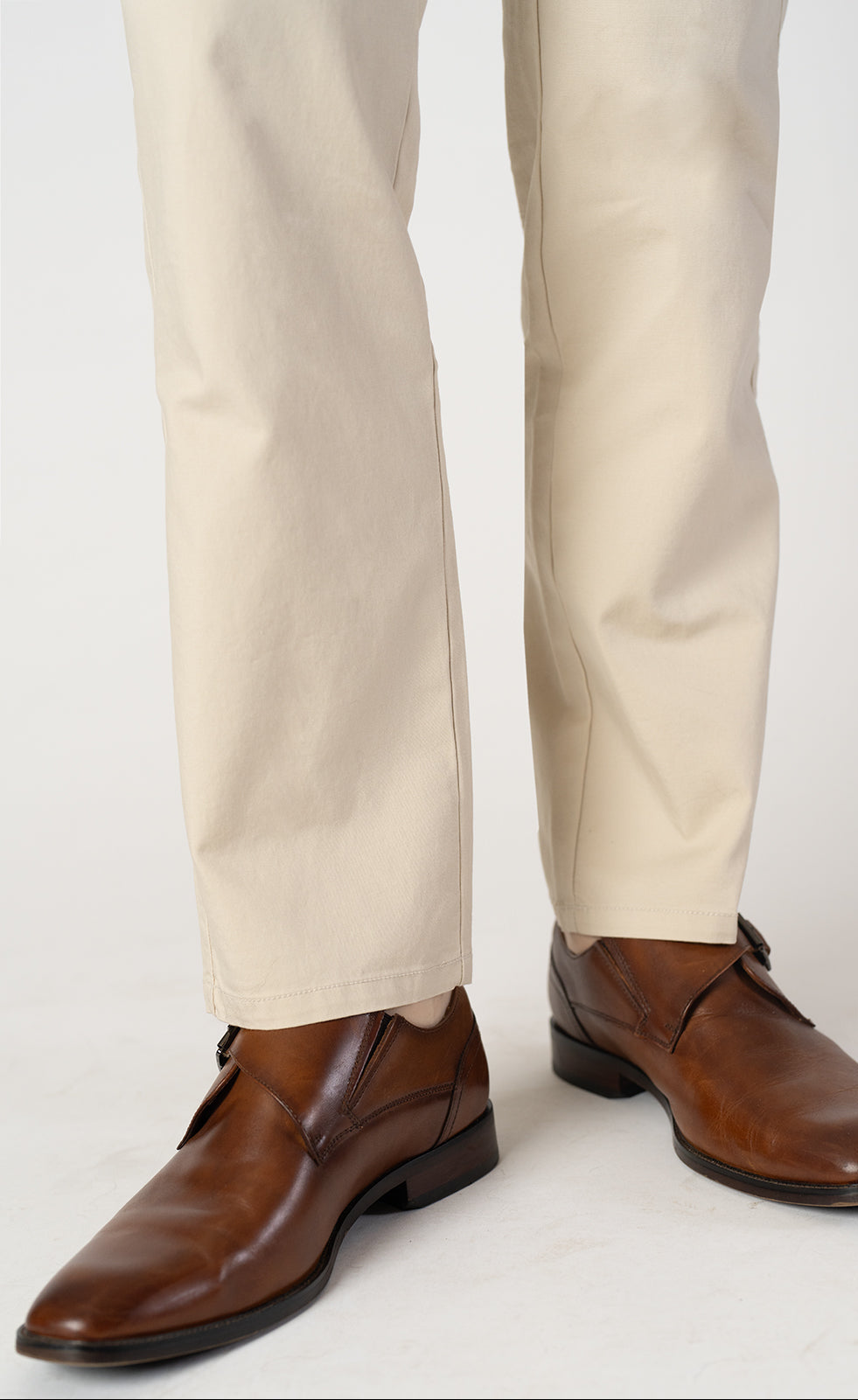 Close view of the clean drape of New Found Thread pants